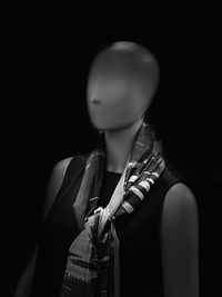 Mannequin against black background