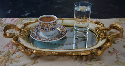 High angle view of coffee cup on table