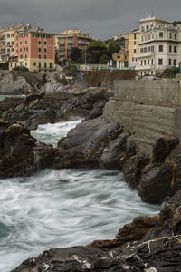 View of buildings by sea