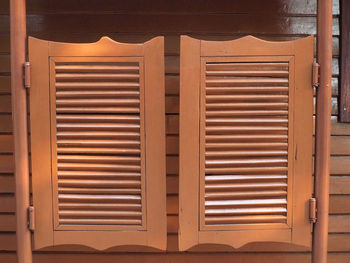 Close-up of closed wooden door of building