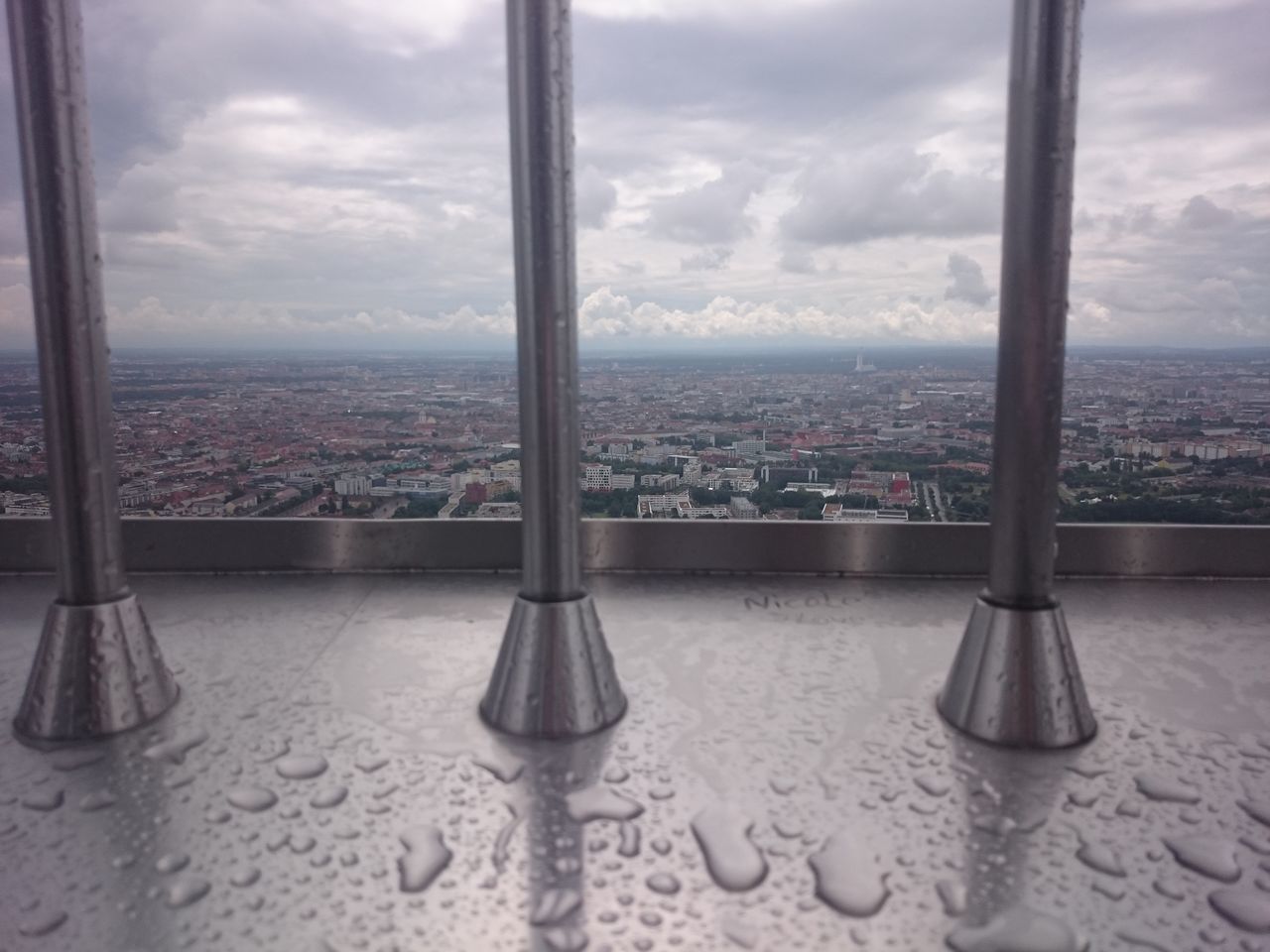 CITYSCAPE SEEN THROUGH WINDOW