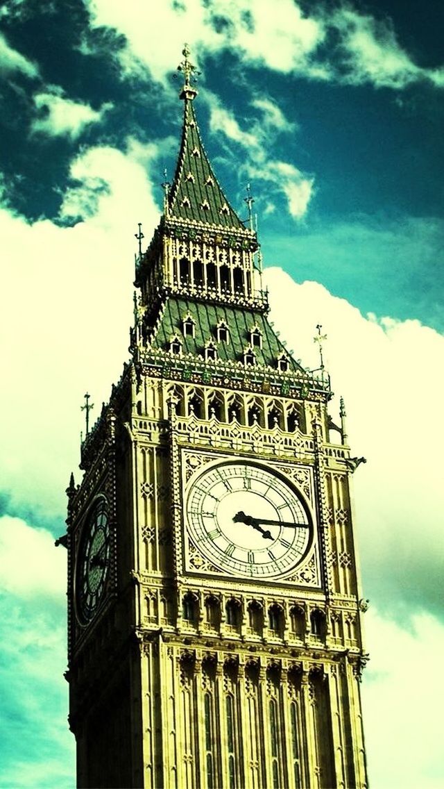 low angle view, architecture, sky, building exterior, clock tower, built structure, tower, religion, church, clock, time, place of worship, cloud - sky, spirituality, famous place, history, tall - high, travel destinations