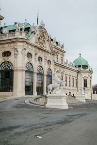 Statue of historic building against sky