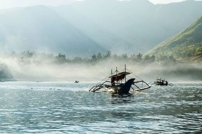 Boat sailing in sea