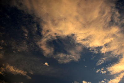 Low angle view of clouds in sky during sunset