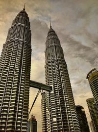 Low angle view of modern buildings against sky