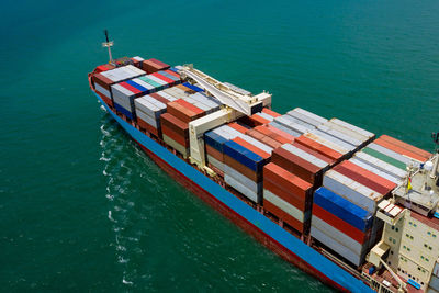 High angle view of containers ship in sea