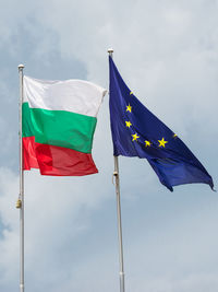 Low angle view of flag against sky