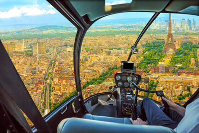 View of cityscape through window