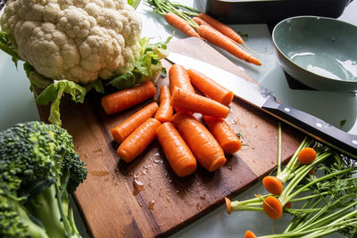 High angle view of chopped vegetables on cutting board