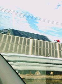 Low angle view of modern building against sky