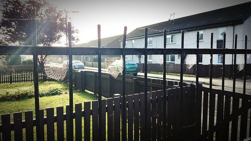 Fence in front of built structure