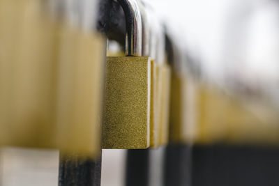 Close-up of metal hanging on table