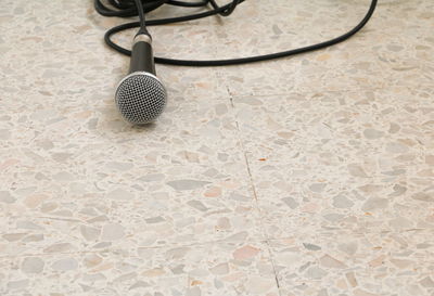 High angle view of microphone on floor