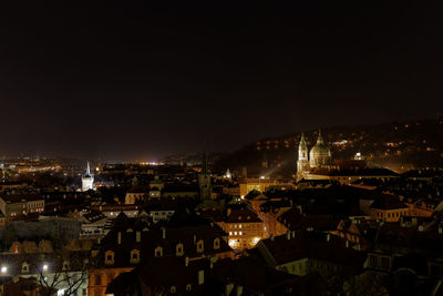 High angle shot of illuminated cityscape against sky at night