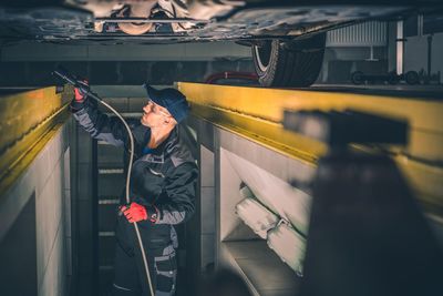 Mechanic working in auto repair shop