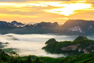 Scenic view of mountains against sky during sunset