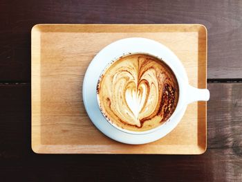 High angle view of cappuccino on table