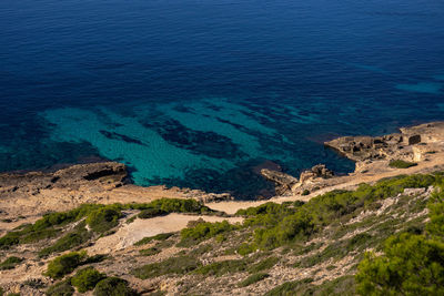 High angle view of rocks on beach