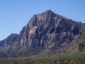 Scenic view of rocky mountains against clear sky