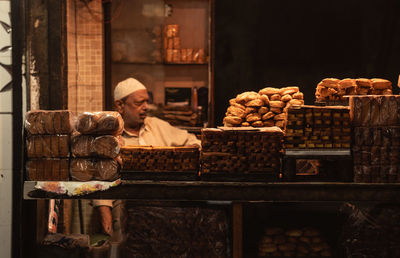 Man having food in store