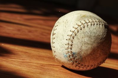 Close-up of ball on wooden table