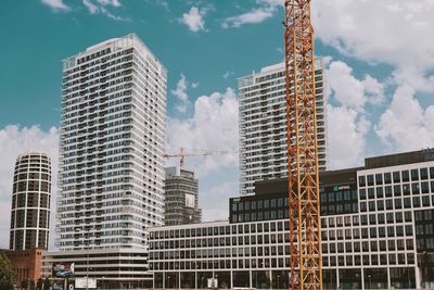 Low angle view of modern buildings against sky