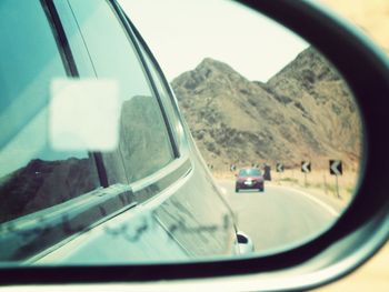 Road seen through car windshield