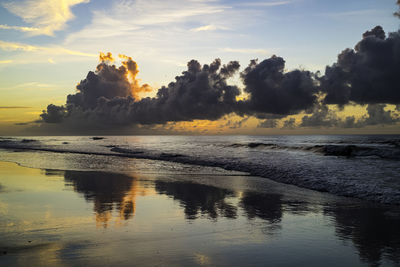 Scenic view of sea against sky at sunset