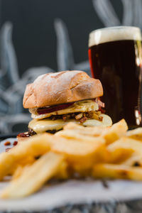 Close-up of fast food with drink