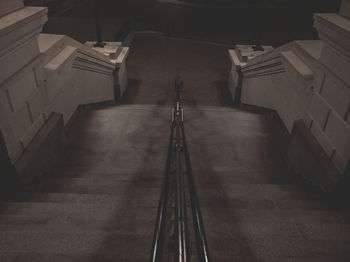 High angle view of staircase amidst buildings in temple