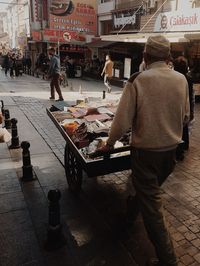 People on street in city