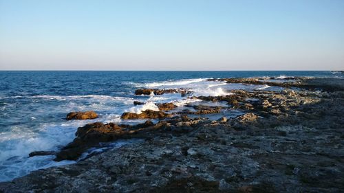 Scenic view of sea against clear sky