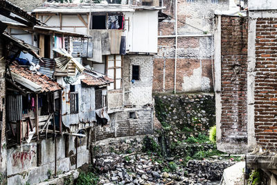 Clothes drying on wall of old building