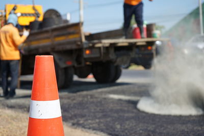 Traffic cone on road at construction site