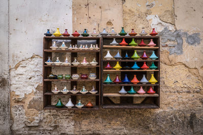 Multi colored ceramics on shelf 