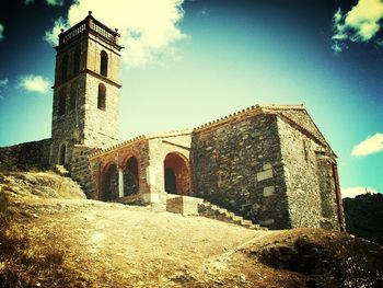 Low angle view of old building against sky