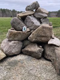 Stack of stones on field