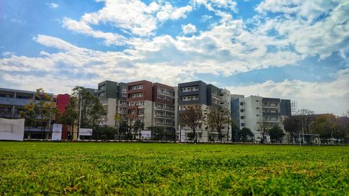 View of residential buildings against sky