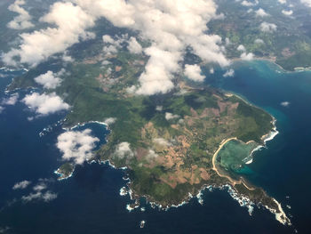 Aerial view of island amidst sea