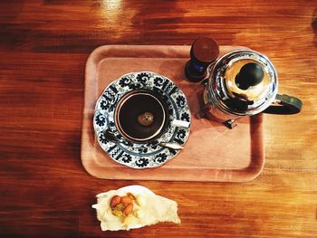 High angle view of coffee cup on table