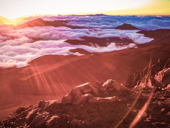 Scenic view of landscape against sky during sunset