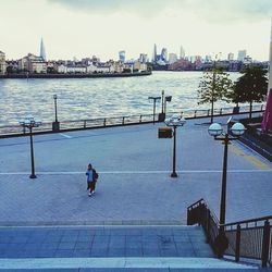 View of bridge over river in city