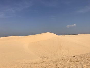 Scenic view of desert against sky