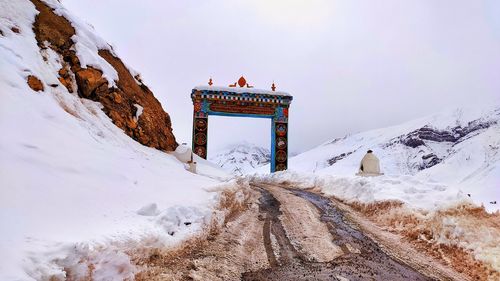 Scenic view of snow covered mountain against sky