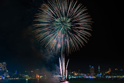 Firework display at night