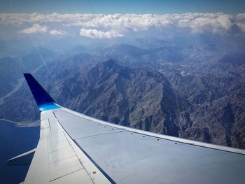 Aerial view of mountains against sky