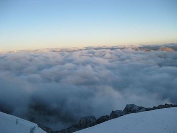 Scenic view of landscape against cloudy sky