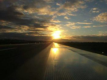 Sun shining through clouds