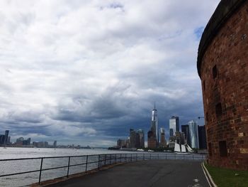 View of city against cloudy sky
